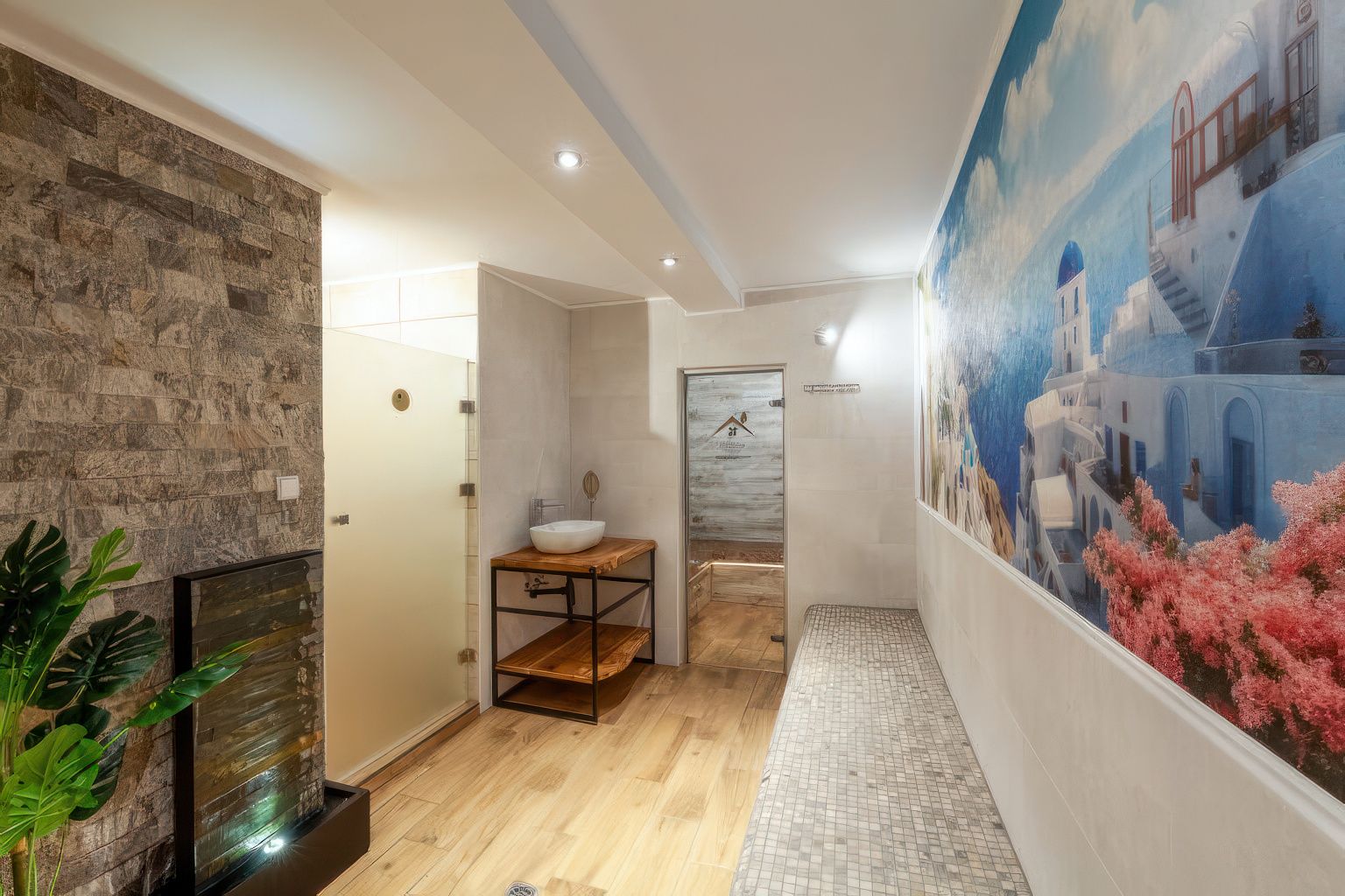 Elegancka szatnia strefy SPA Willa OdNova w Tyliczu - umywalka ceramiczna, kamień naturalny i ciepłe oświetlenie